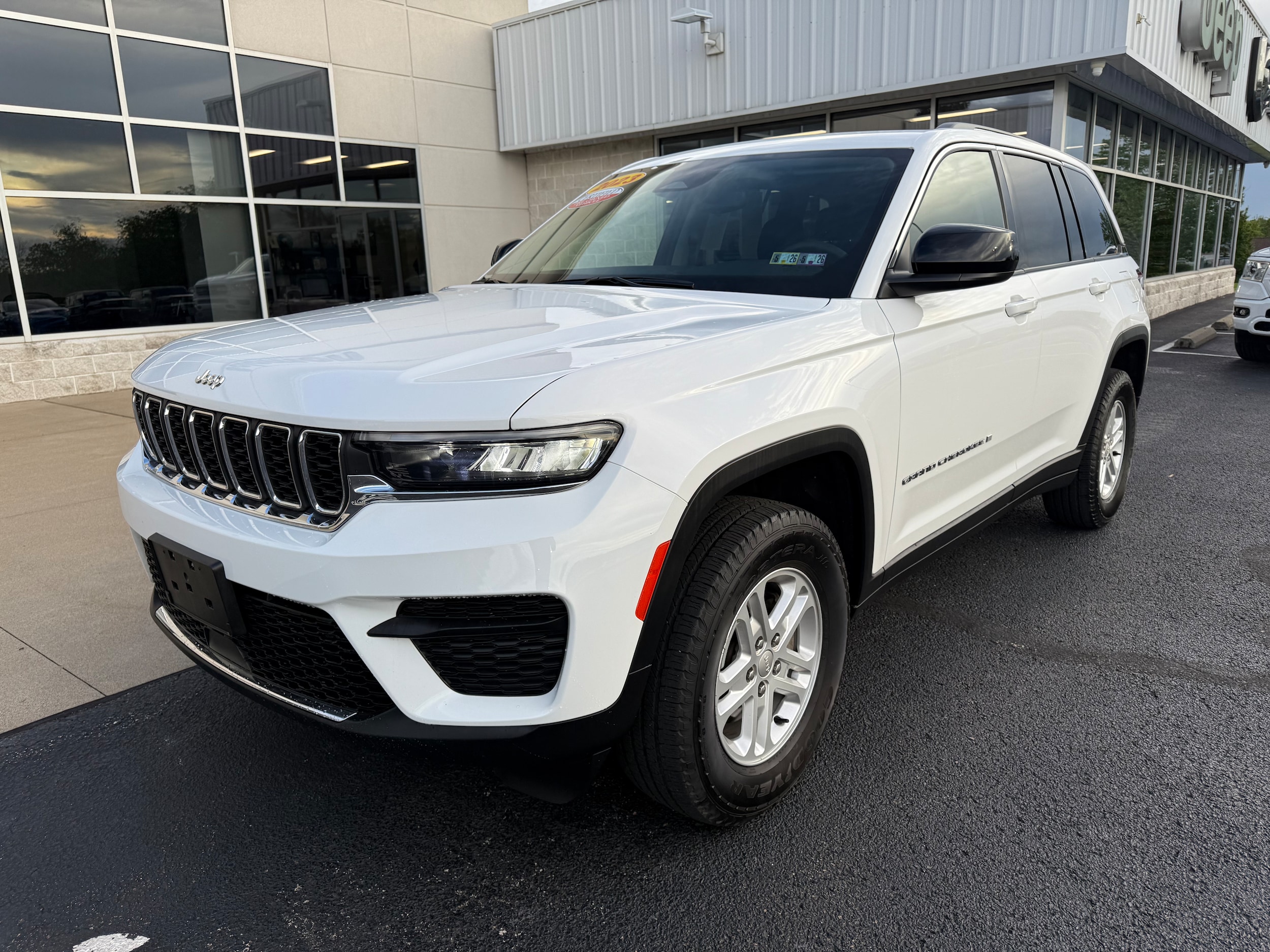 Certified 2023 Jeep Grand Cherokee Laredo with VIN 1C4RJHAG9PC528563 for sale in Brownsville, PA