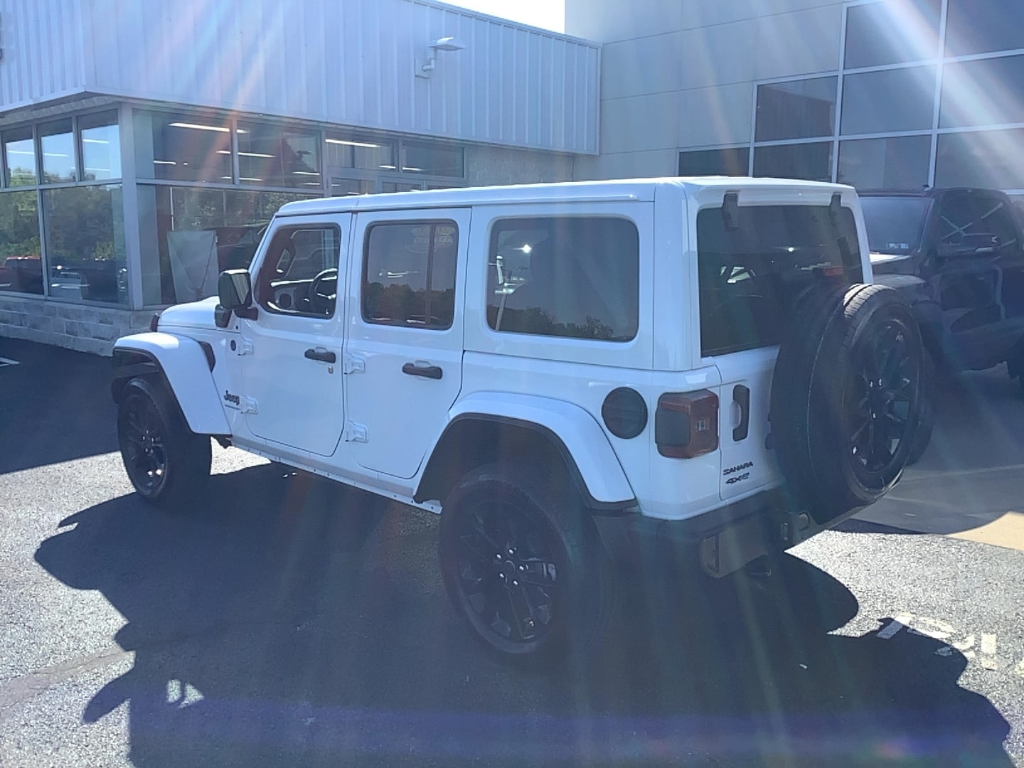 2025 Jeep Wrangler 4xe Sahara Bright White Clearcoat at Solomon CJD Brownsville