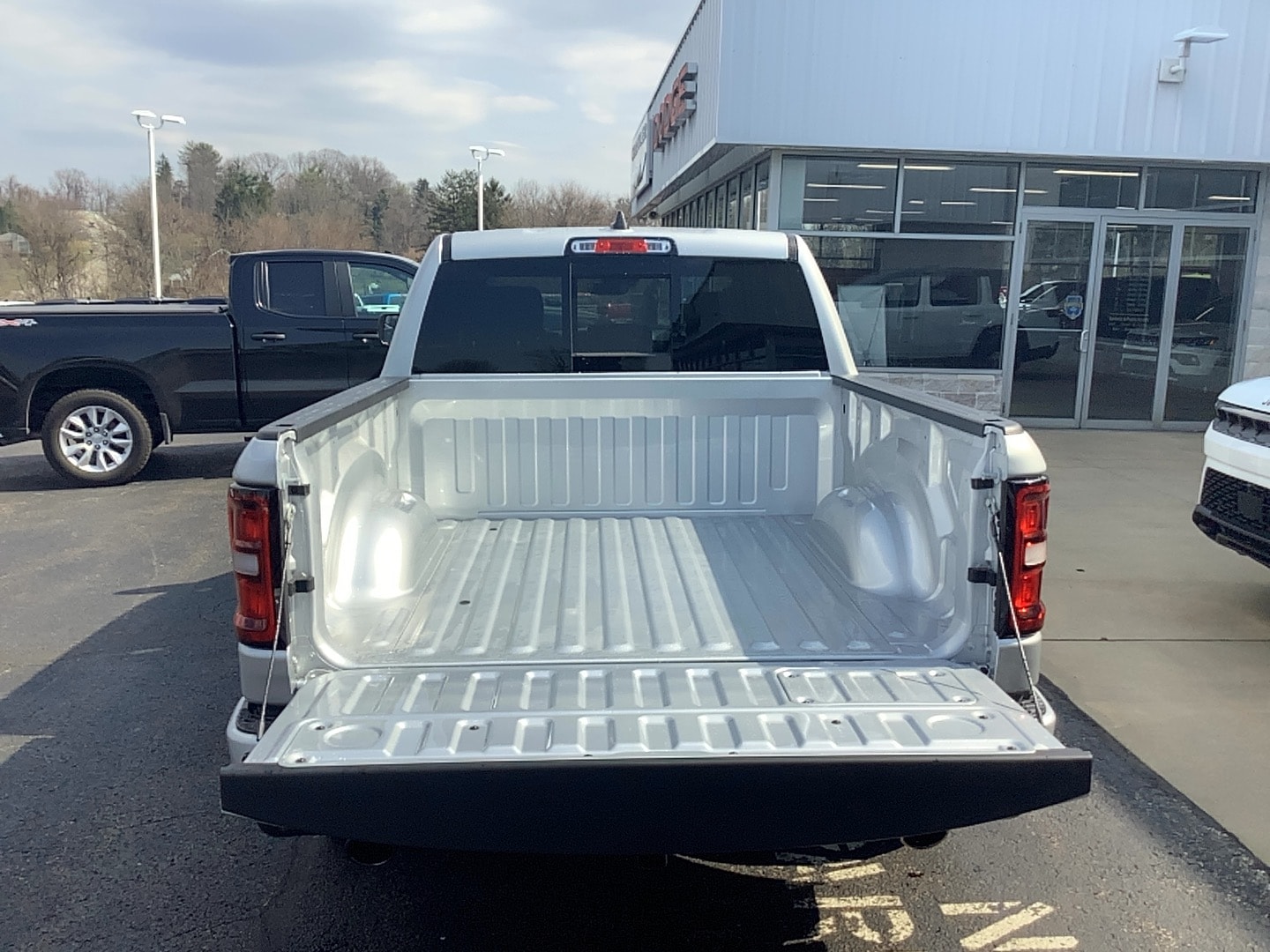 2026 Ram 1500 LARAMIE CREW CAB 4X4 5'7 BOX Silver Zynith at Solomon CJD Brownsville