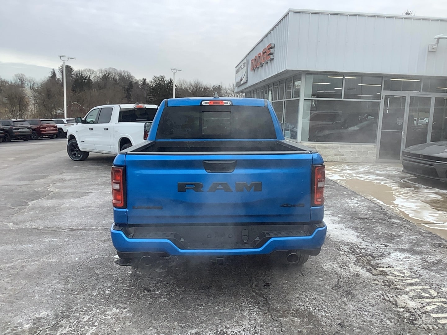 2026 Ram 1500 LARAMIE CREW CAB 4X4 5'7 BOX Hydro Blue Pearlcoat at Solomon CJD Carmichaels