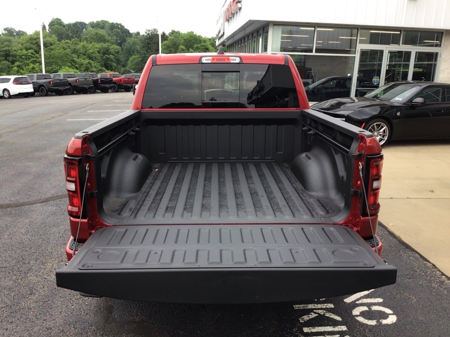 2026 Ram 1500 BIG HORN CREW CAB 4X4 5'7 BOX Molten Red Pearlcoat at Solomon CJD Carmichaels