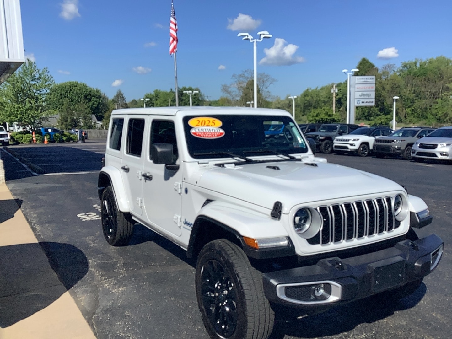 2025 Jeep Wrangler 4xe Sahara Bright White Clearcoat at Solomon CJD Brownsville