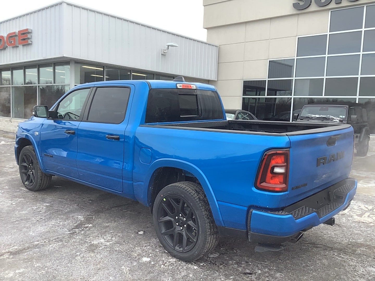 2026 Ram 1500 LARAMIE CREW CAB 4X4 5'7 BOX Hydro Blue Pearlcoat at Solomon CJD Carmichaels
