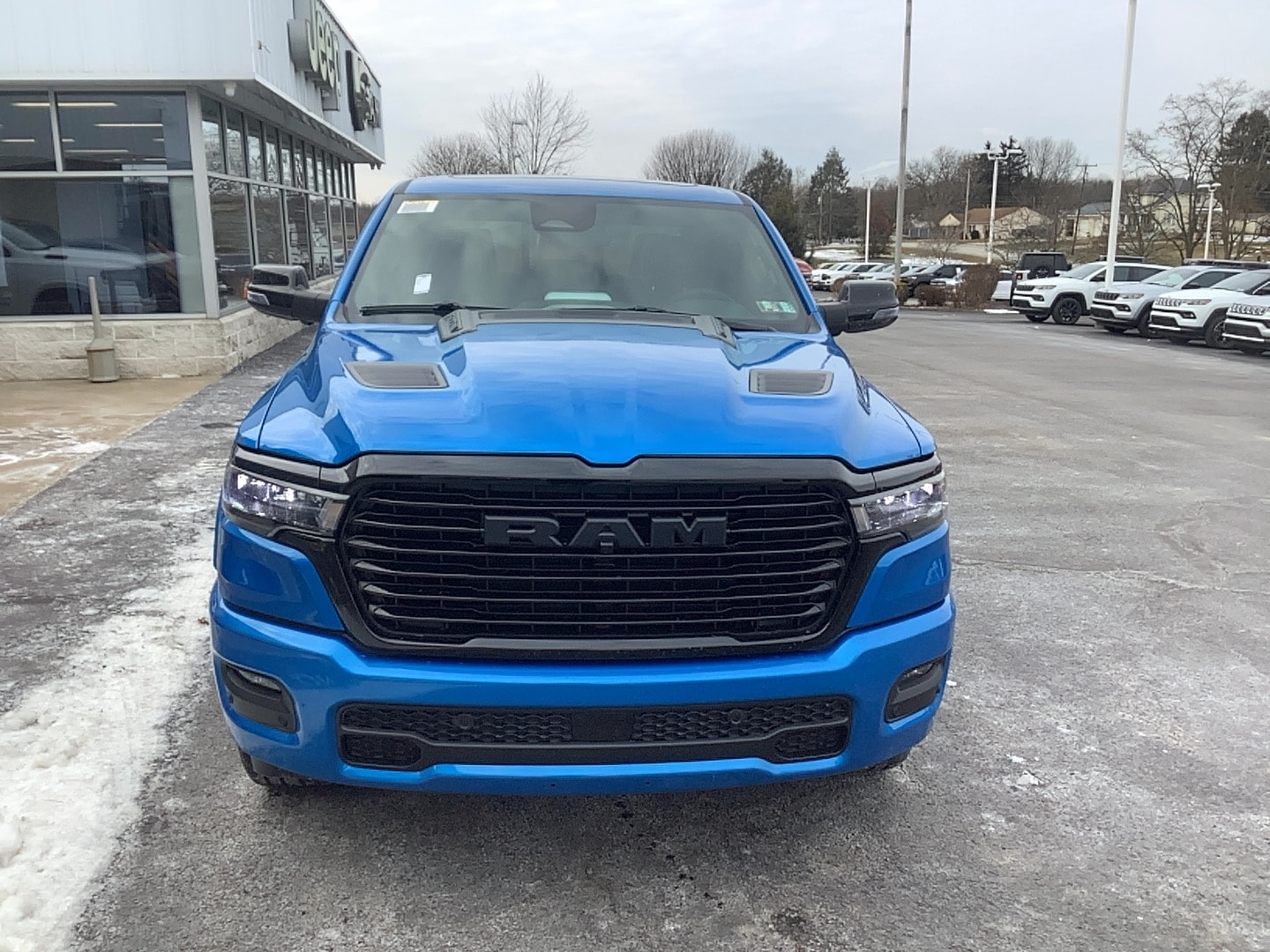 2026 Ram 1500 LARAMIE CREW CAB 4X4 5'7 BOX Hydro Blue Pearlcoat at Solomon CJD Carmichaels