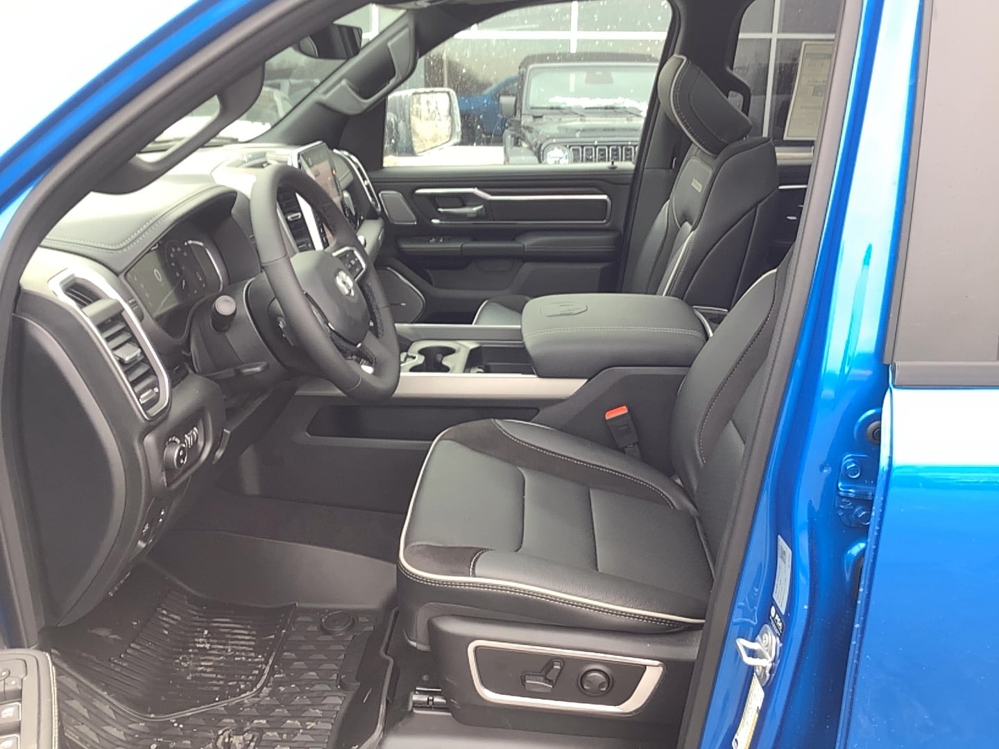2026 Ram 1500 LARAMIE CREW CAB 4X4 5'7 BOX Hydro Blue Pearlcoat at Solomon CJD Carmichaels