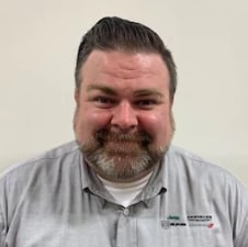 Staff member Jon Glenn Schach from 479eb35d0622