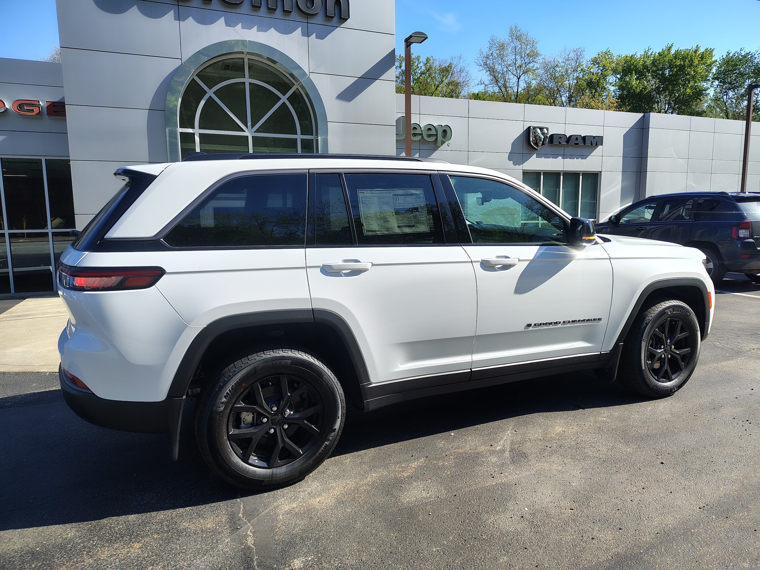 2026 Jeep Grand Cherokee LAREDO ALTITUDE 4X4 Bright White at Rick Weaver GMC