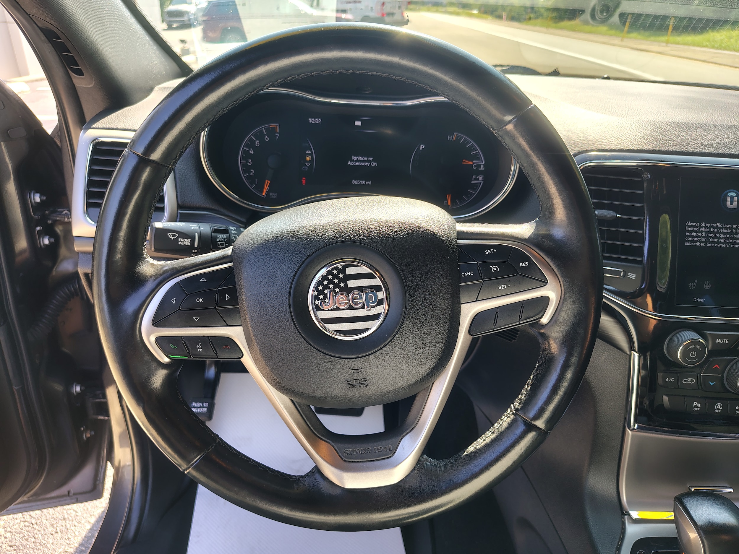 2021 Jeep Grand Cherokee Laredo X Granite Crystal Metallic Clearcoat at Solomon CJD Carmichaels