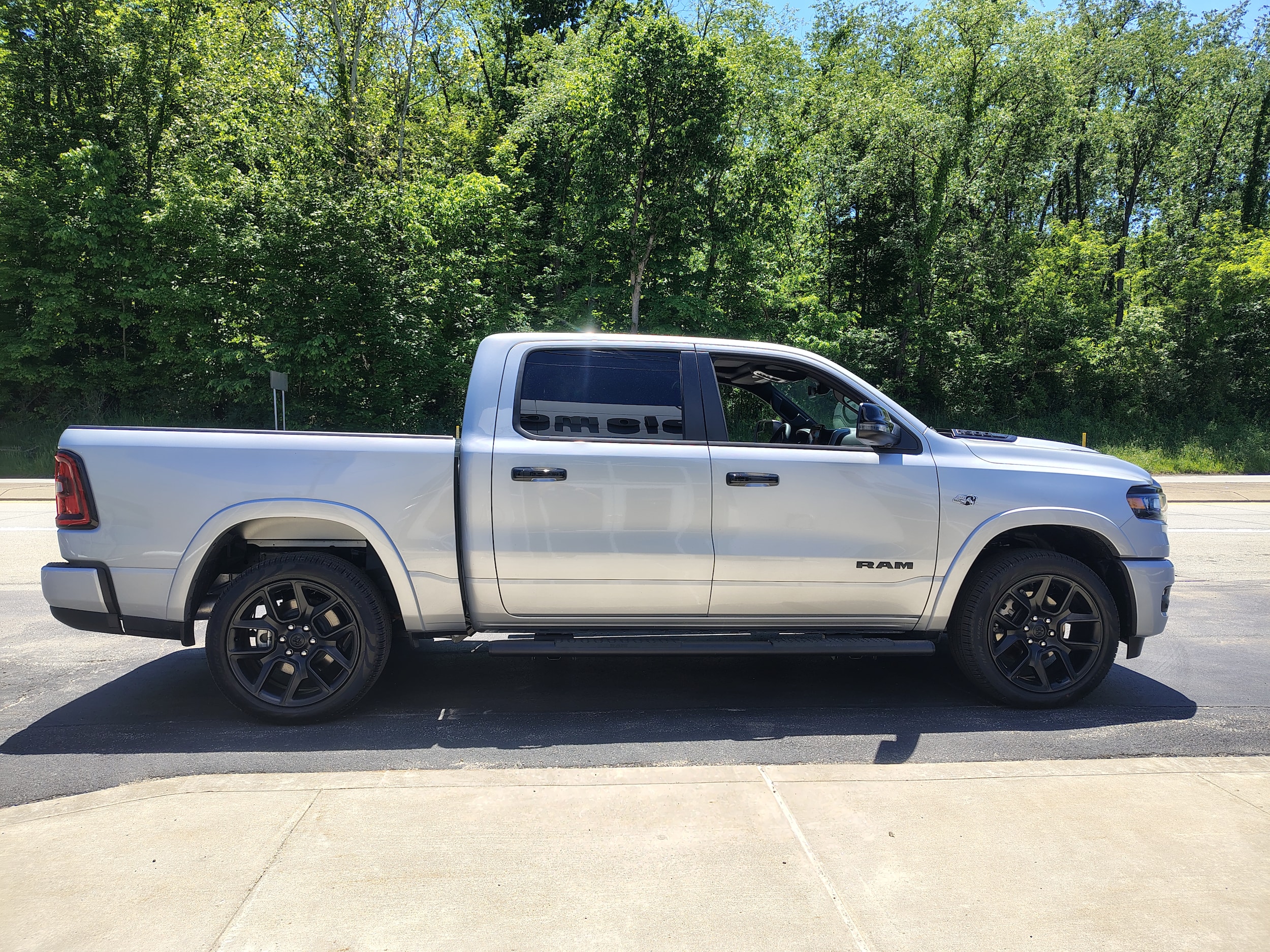 2026 Ram 1500 LARAMIE CREW CAB 4X4 5'7 BOX Silver Zynith at Solomon CJD Carmichaels