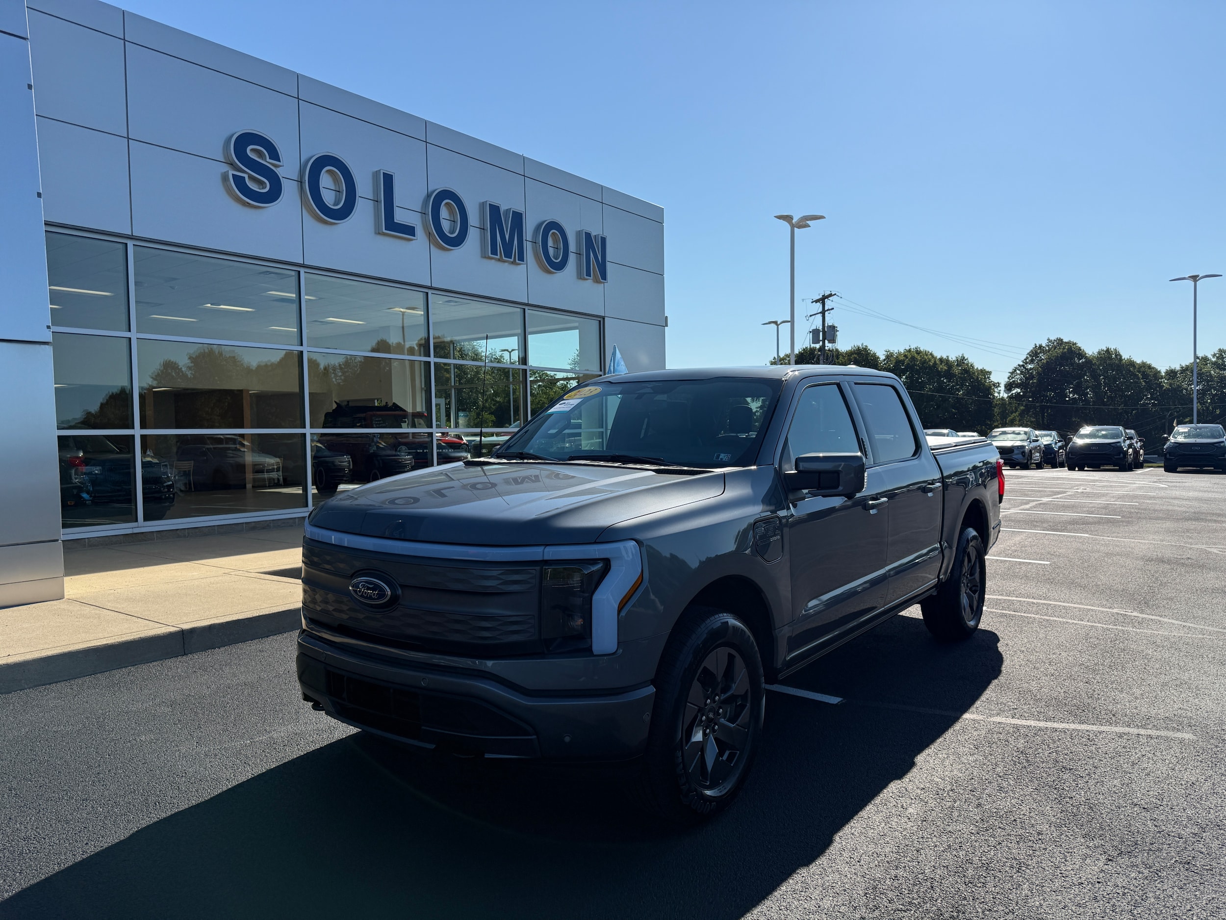 Certified 2023 Ford F-150 Lightning Lariat with VIN 1FT6W1EV0PWG40347 for sale in Brownsville, PA