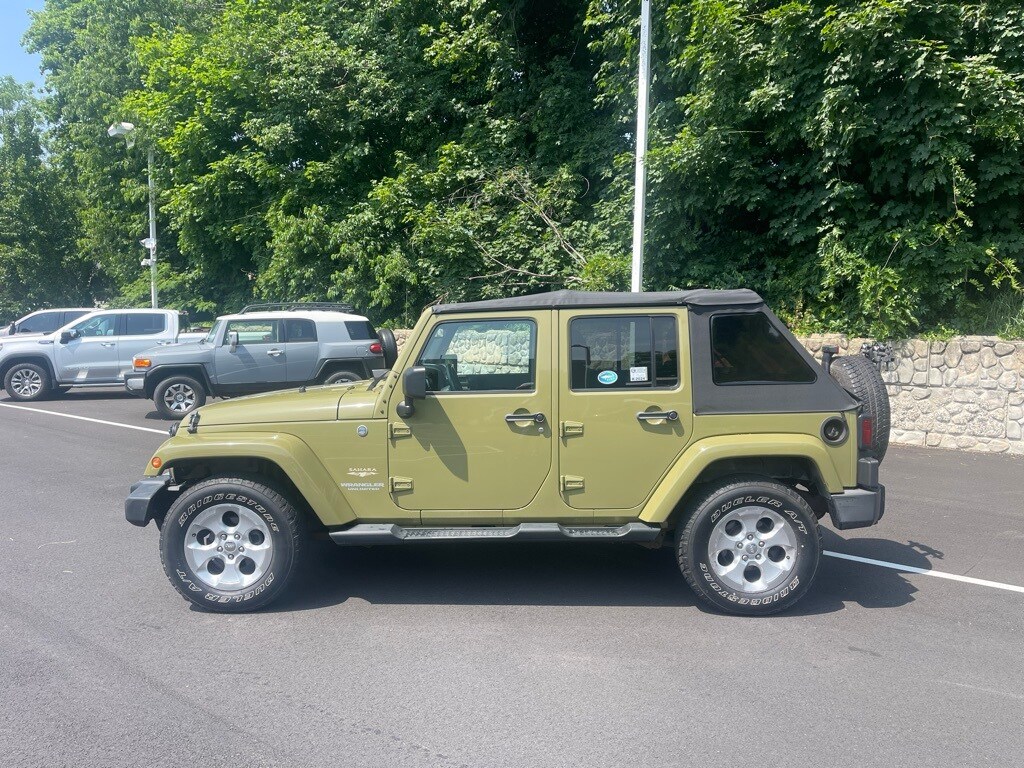 Used 2013 Jeep Wrangler Unlimited Sahara with VIN 1C4HJWEG4DL575439 for sale in Orange, MA