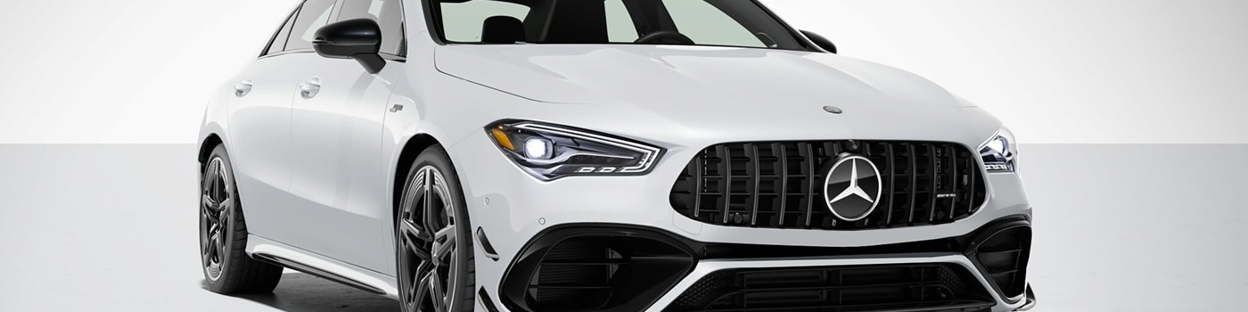 White Mercedes-Benz AMG CLA 45 parked in a white void