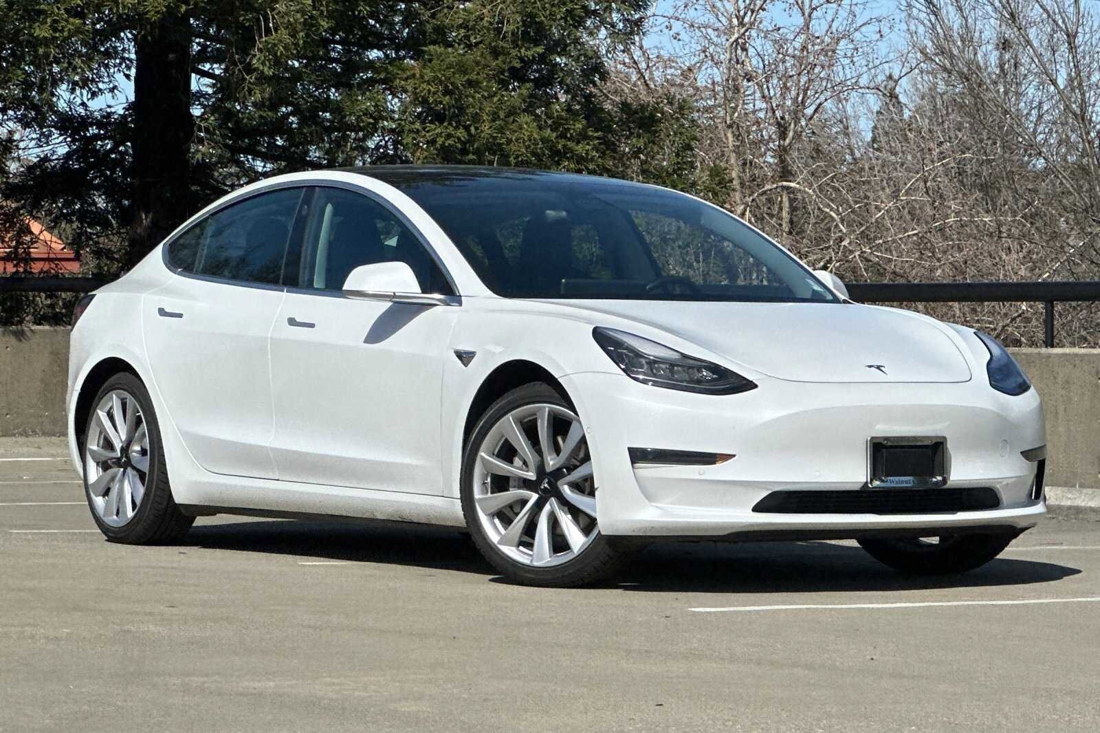 Pre owned tesla online 3