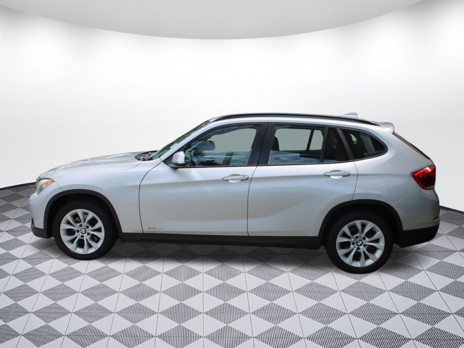 Used 2014 BMW X1 28i with VIN WBAVL1C58EVY13006 for sale in Fort Myers, FL