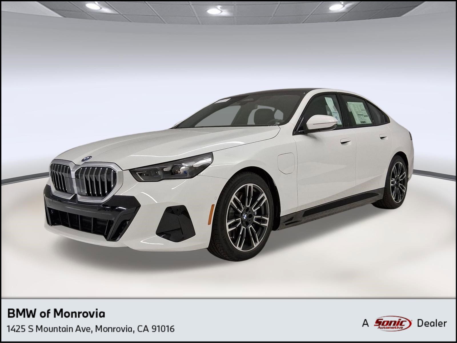 2026 BMW 5 Series 550e xDrive Sedan's photo