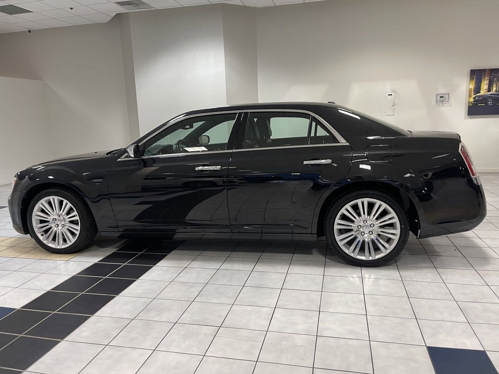 Used 2014 Chrysler 300 C with VIN 2C3CCAEG6EH146085 for sale in Orlando, FL