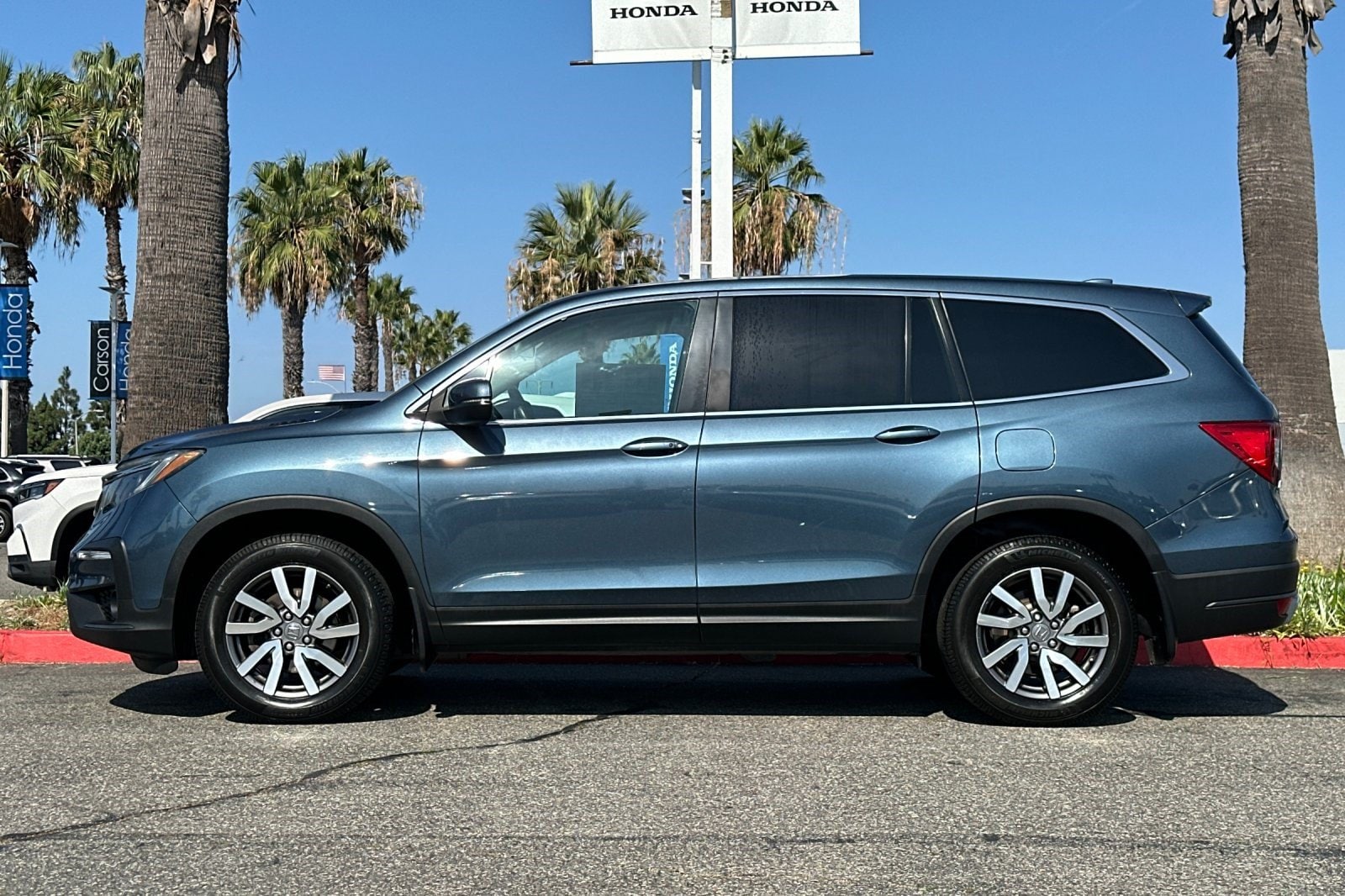 Used 2021 Honda Pilot EX with VIN 5FNYF5H34MB040988 for sale in Carson, CA