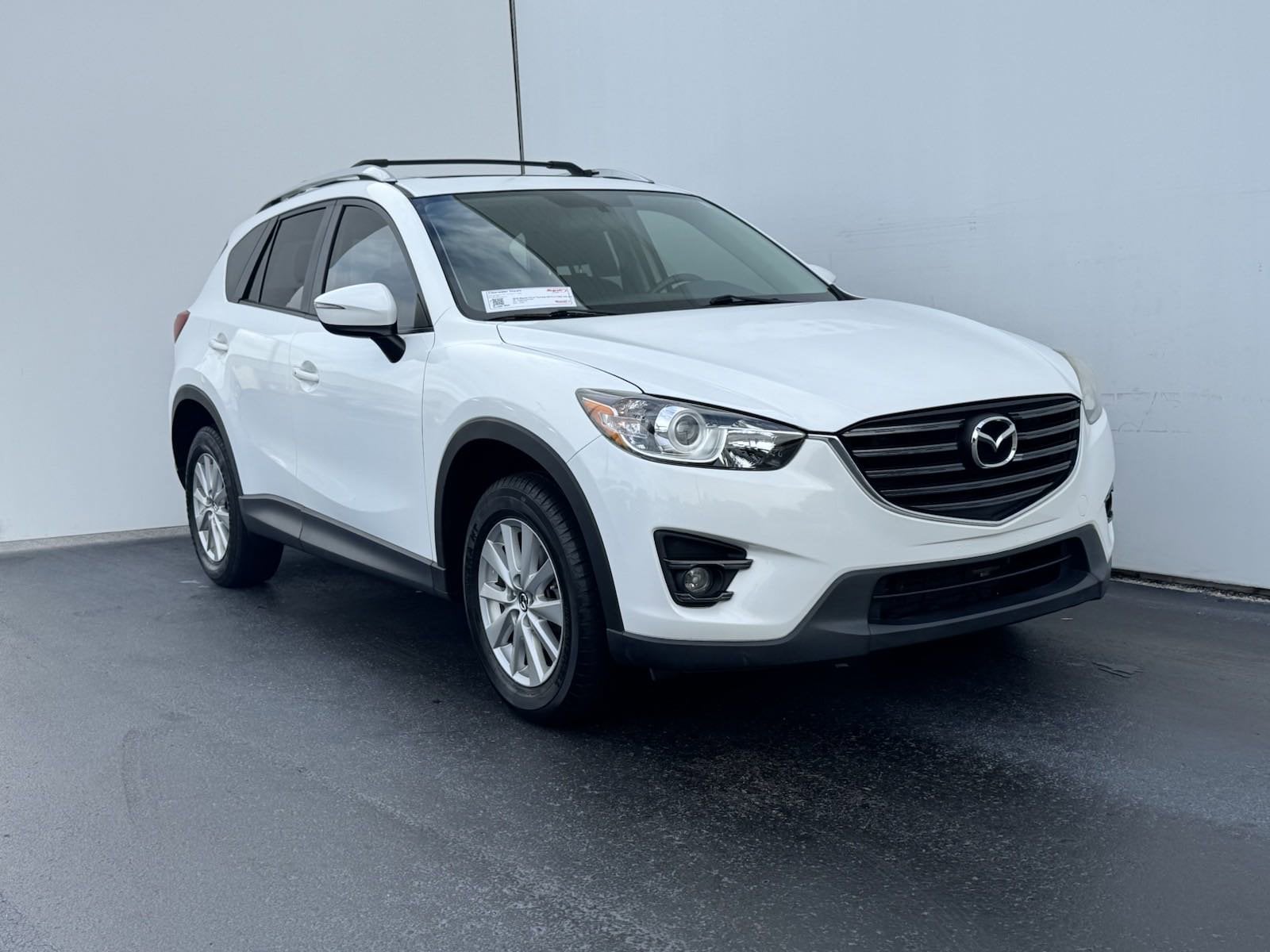 Used 2016 Mazda CX-5 Touring with VIN JM3KE2CY8G0775400 for sale in Clearwater, FL