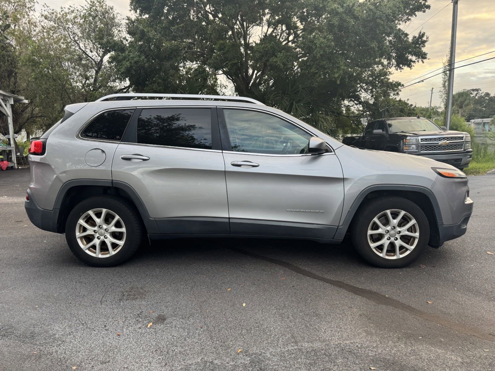 Used 2015 Jeep Cherokee Latitude with VIN 1C4PJLCBXFW793565 for sale in Clearwater, FL