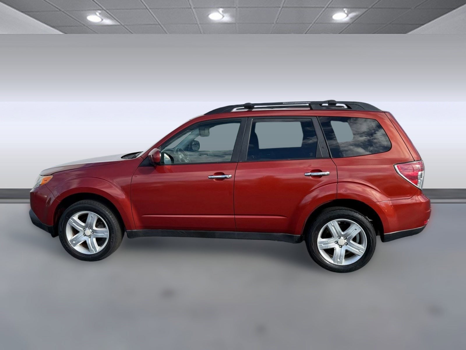 Used 2010 Subaru Forester X Premium with VIN JF2SH6CCXAH780751 for sale in Clearwater, FL