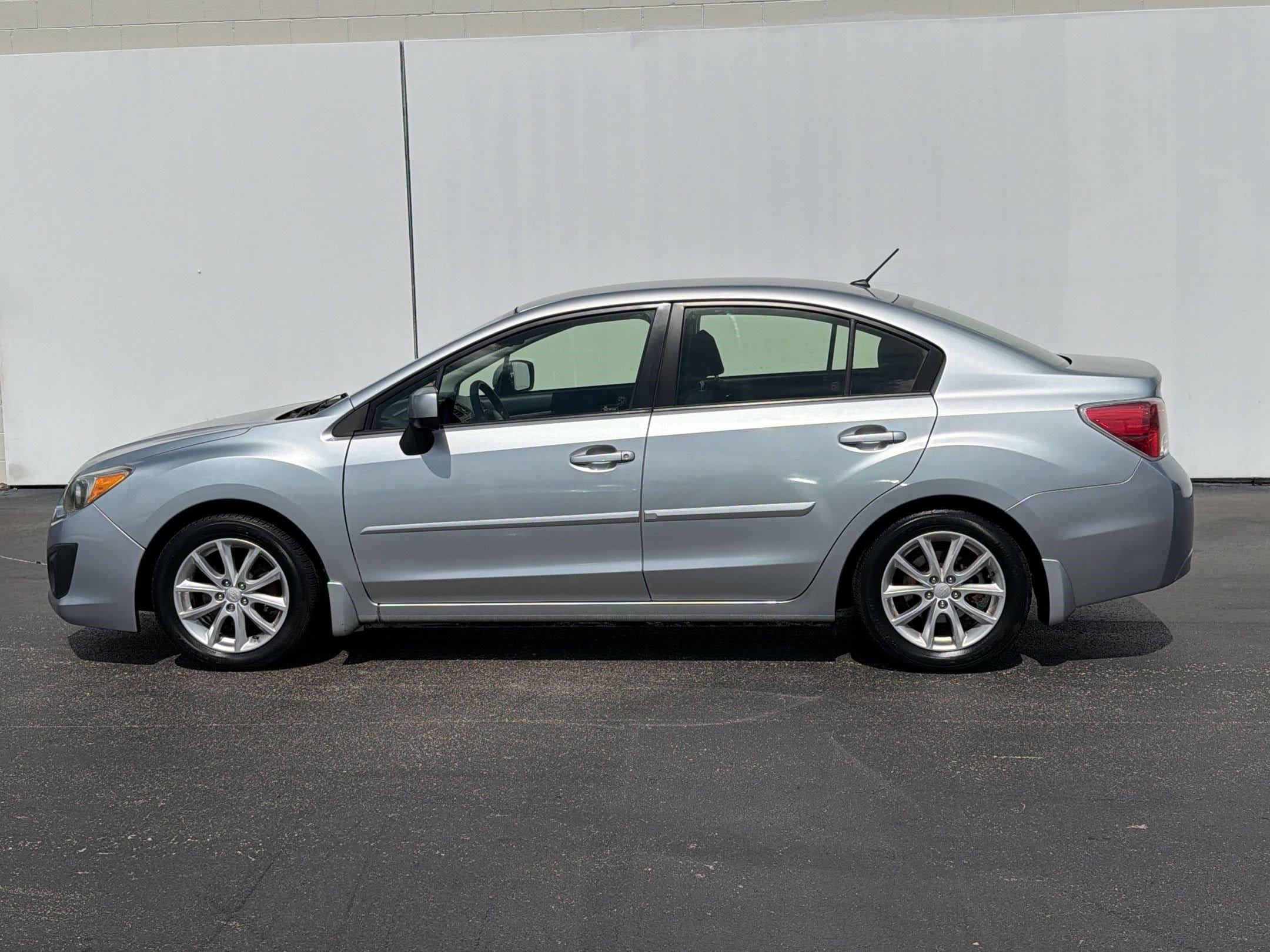 Used 2013 Subaru Impreza 2.0I Premium with VIN JF1GJAC65DH015270 for sale in Clearwater, FL