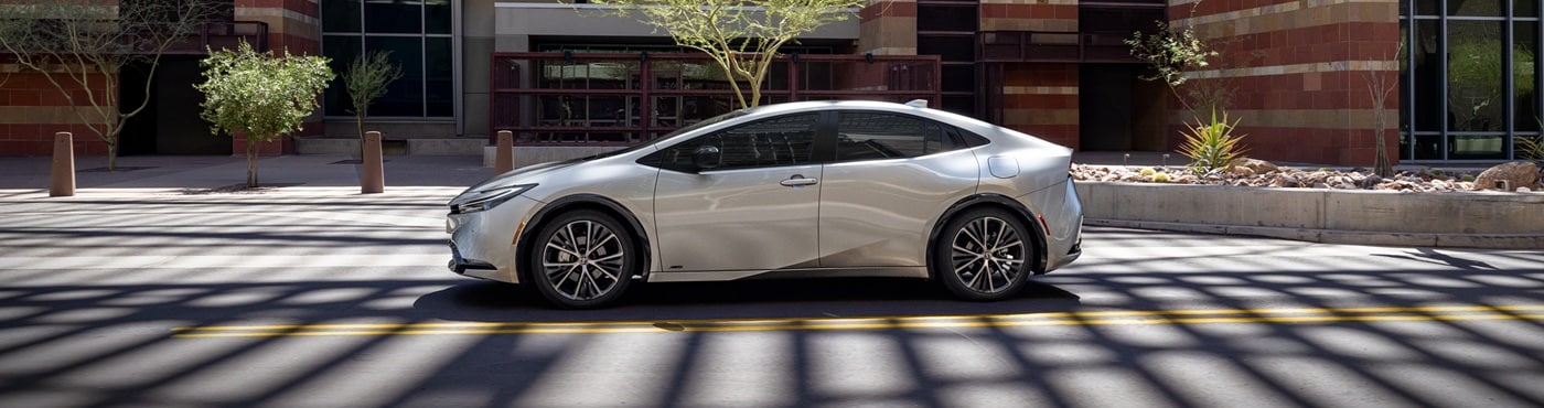Silver Toyota Prius XLE parked in a desert city