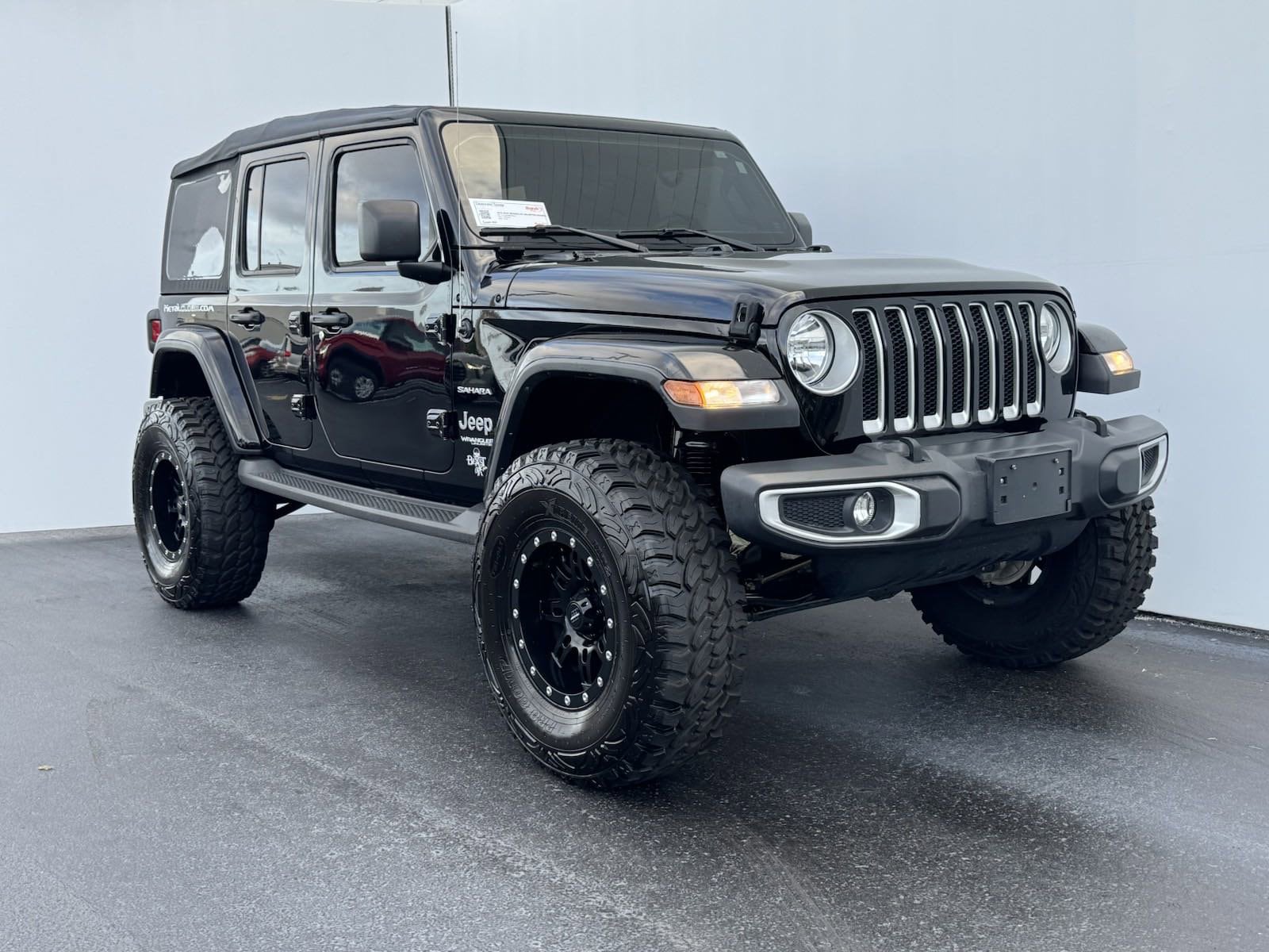 Used 2019 Jeep Wrangler Unlimited Sahara with VIN 1C4HJXEN9KW555848 for sale in Clearwater, FL