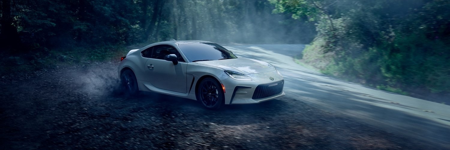 Toyota GR86 driving on a winding road