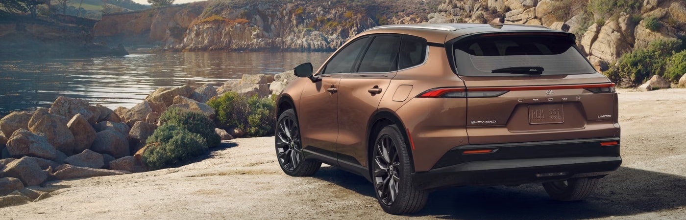 Toyota Crown Limited parked by a reservoir