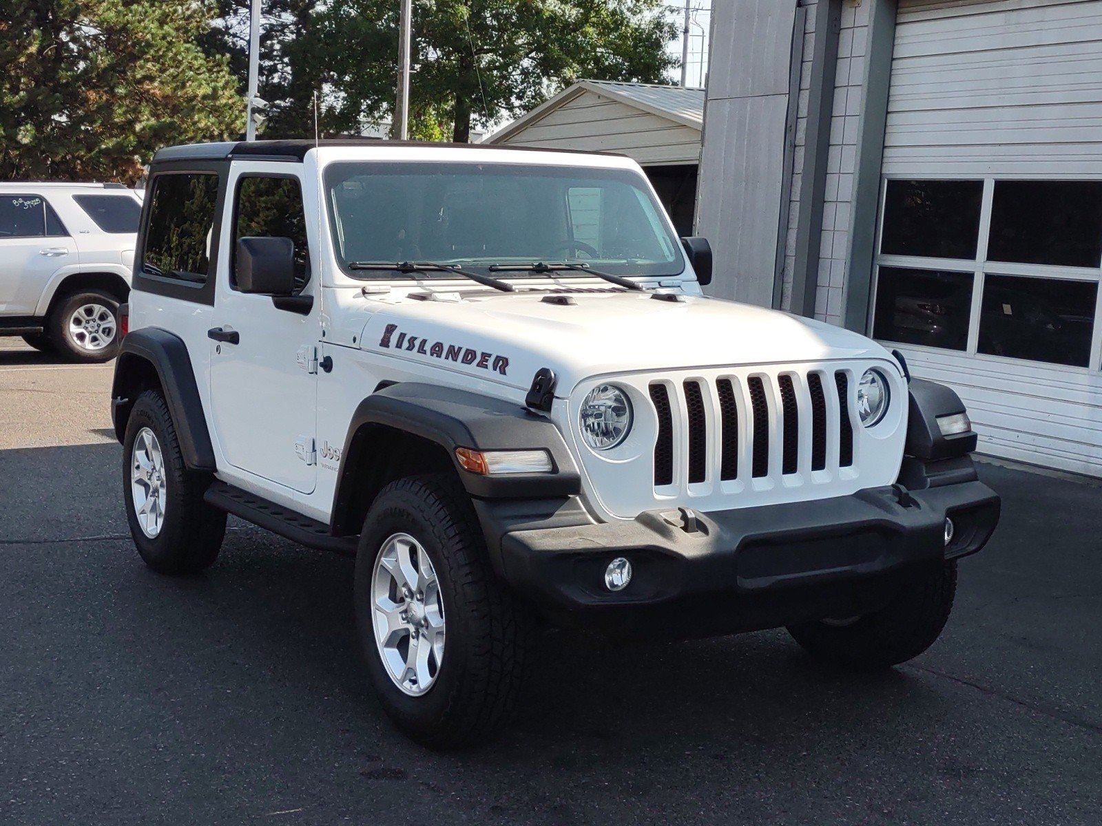 Used 2021 Jeep Wrangler ISLANDER with VIN 1C4GJXANXMW595702 for sale in Nashville, TN