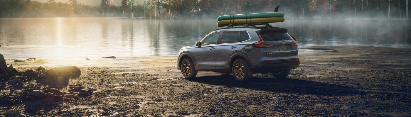 Honda CR-V Grey CR-V parked by a lake