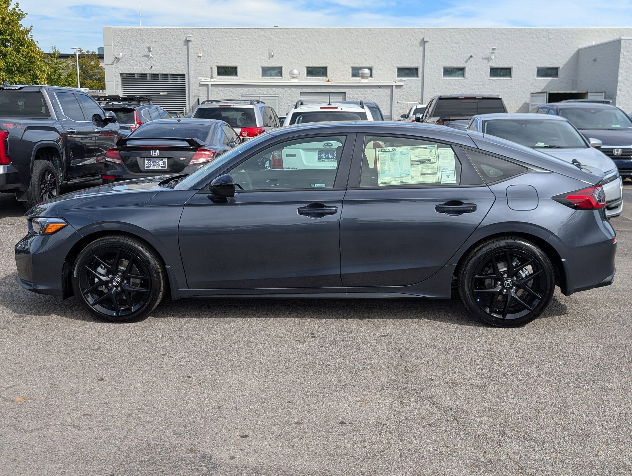 2026 Honda Civic Hybrid Sport Hatchback photo 2