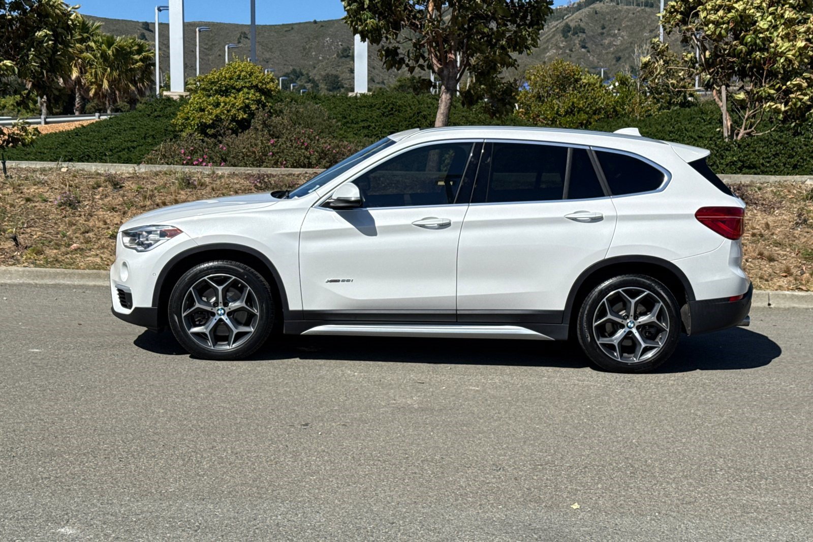 Used 2016 BMW X1 28i with VIN WBXHT3C32GP882813 for sale in Colma, CA