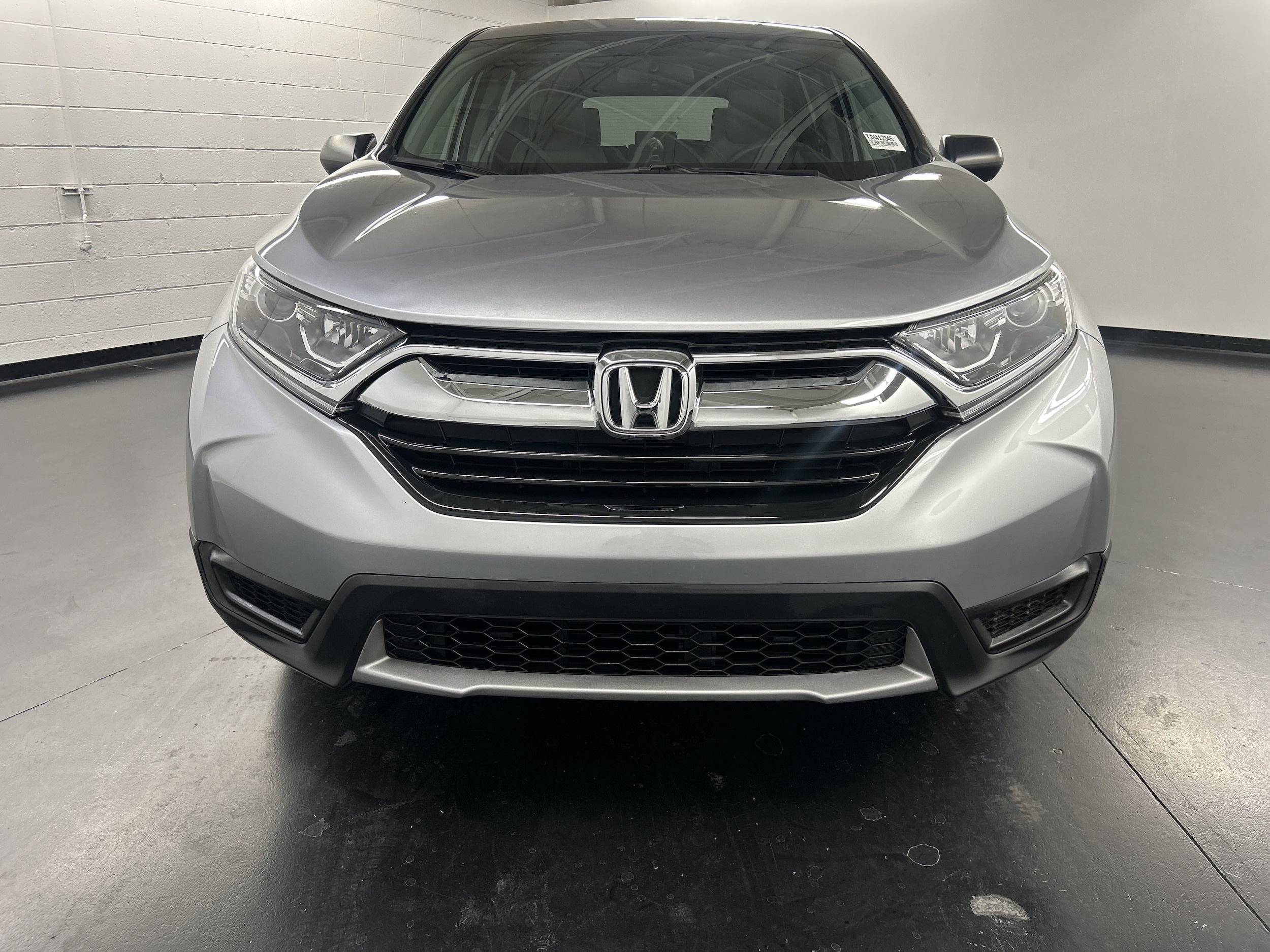 Used 2018 Honda CR-V LX with VIN 2HKRW5H32JH412345 for sale in Las Vegas, NV