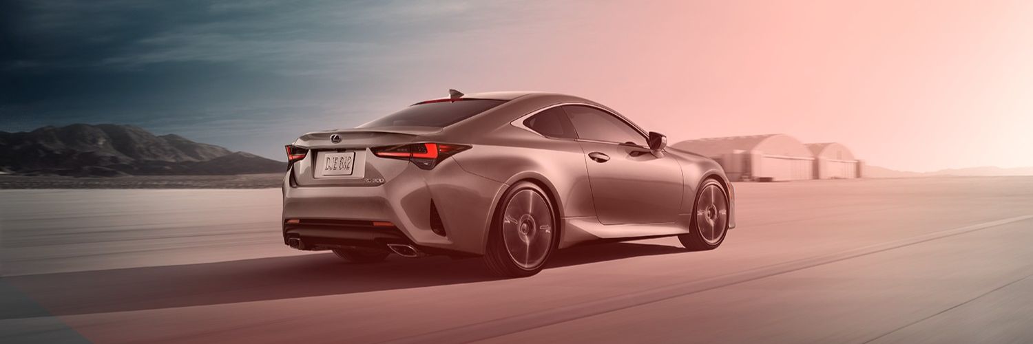Gray Lexus RC driving on a wide road