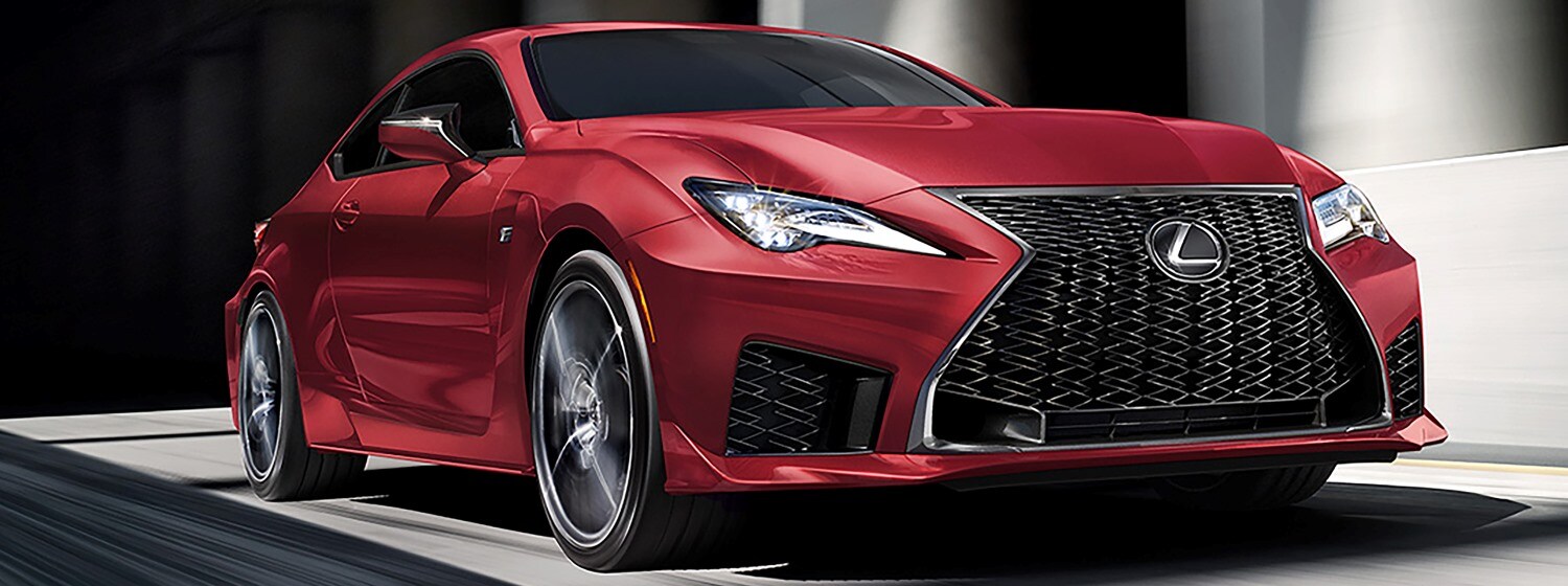 Silver Lexus ES driving in the city