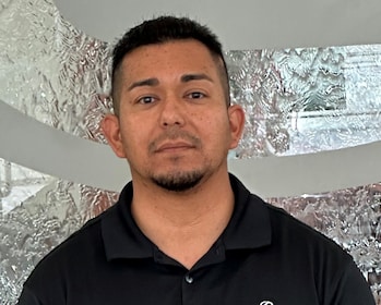 Staff member MANNY GARCIA from ID_29072e12d2e2