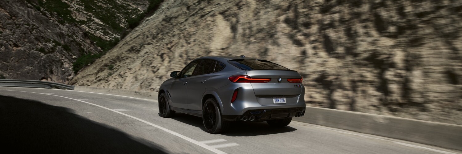 BMW X6 M Back side of silver BMW X6 M
