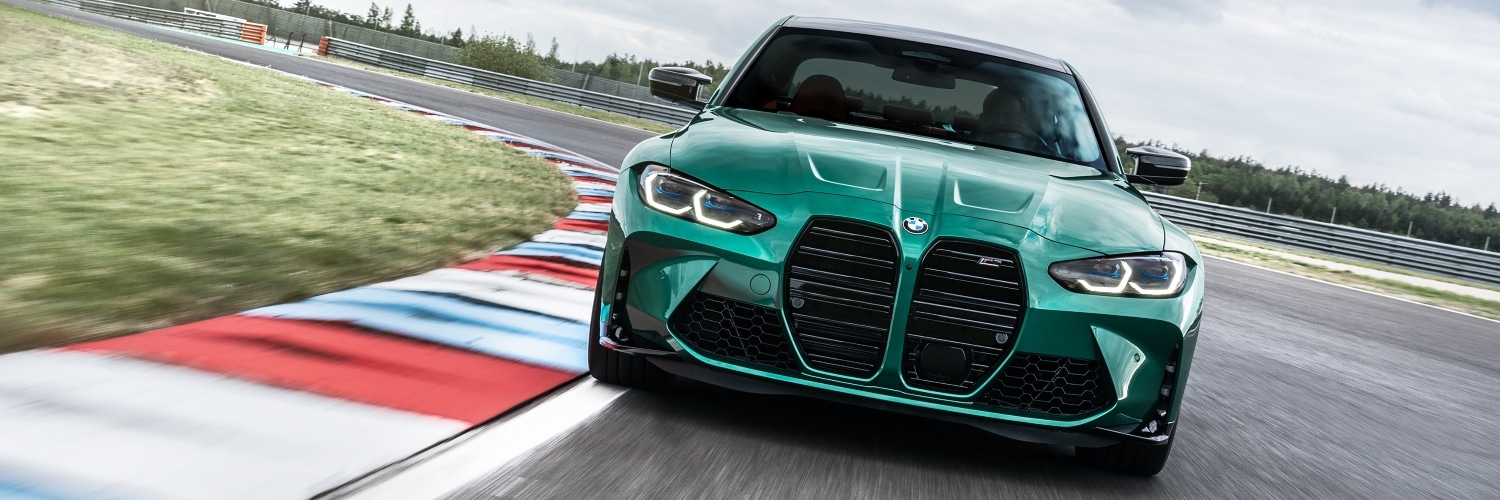 BMW M3 driving on a race track