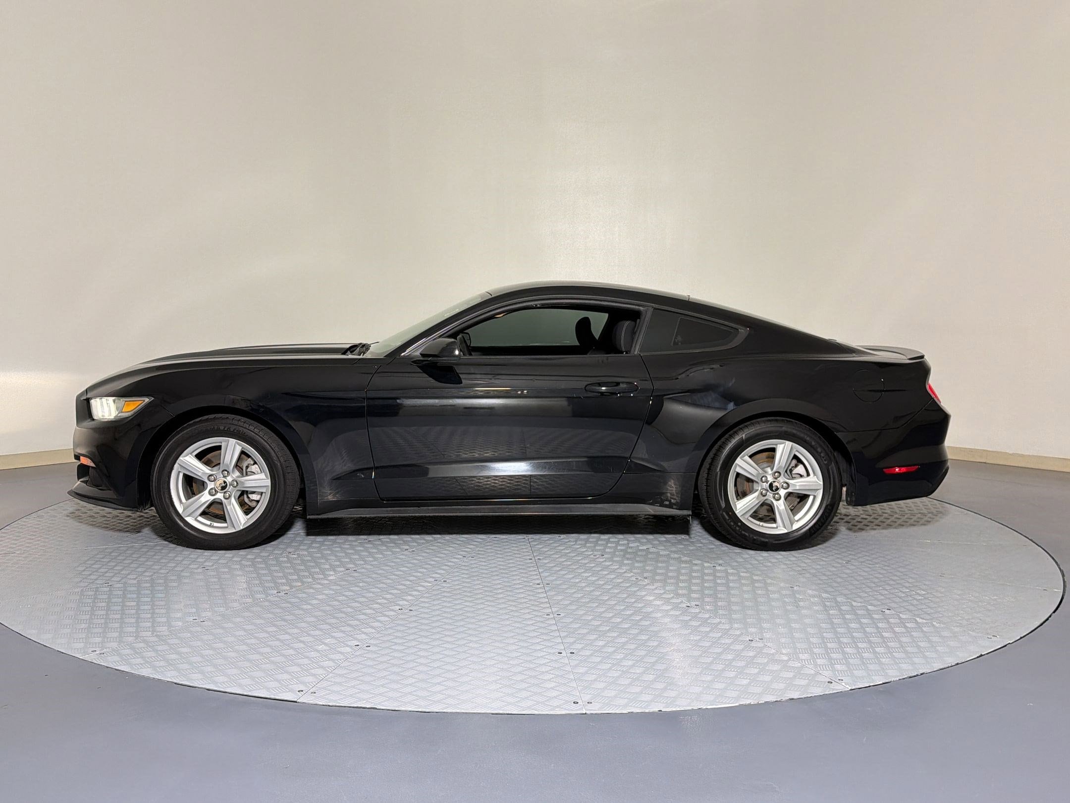 Used 2015 Ford Mustang EcoBoost with VIN 1FA6P8TH8F5335661 for sale in Katy, TX