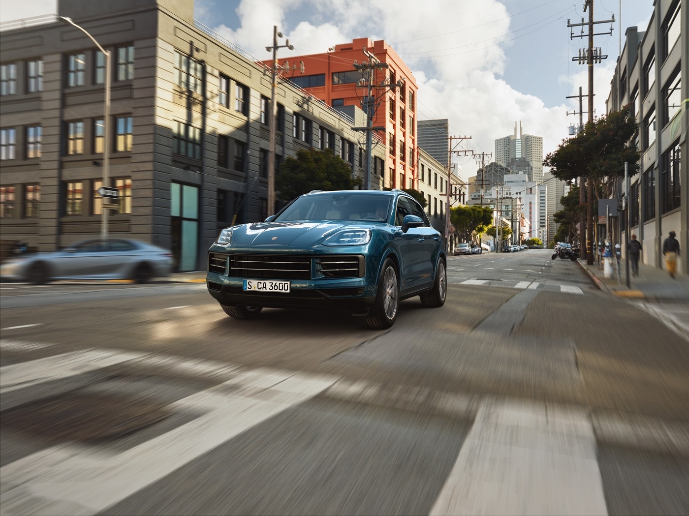 Porsche Cayenne Porsche Cayenne driving in a city