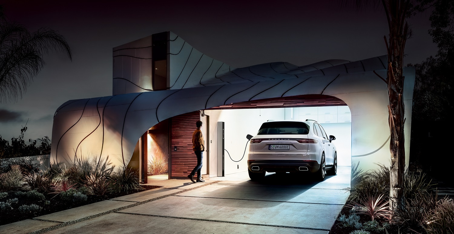 Porsche Cayenne E-Hybrid Cayenne E-Hybrid being charged in a garage