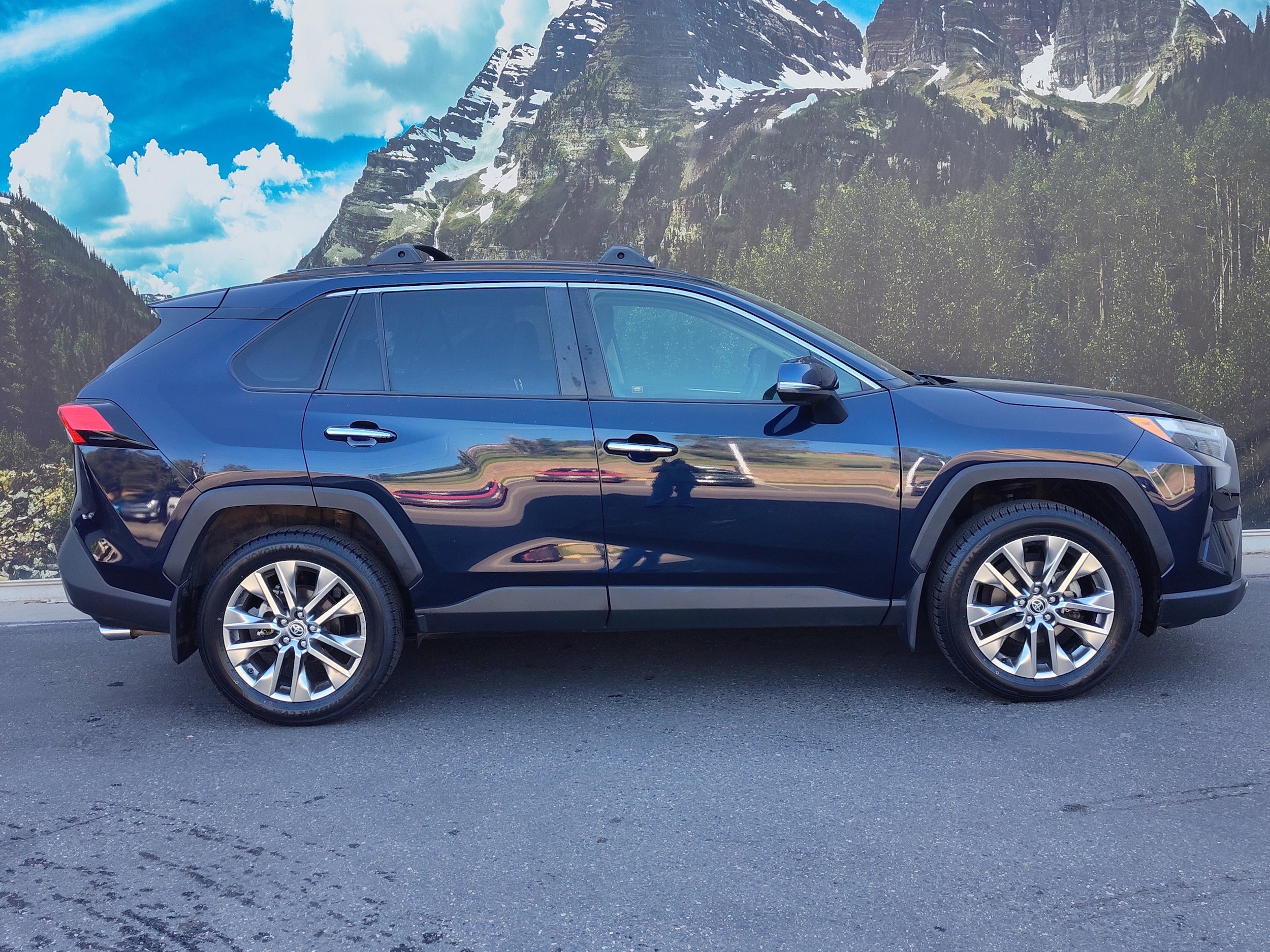 Certified 2022 Toyota RAV4 Limited with VIN JTMN1RFVXND086198 for sale in Denver, CO