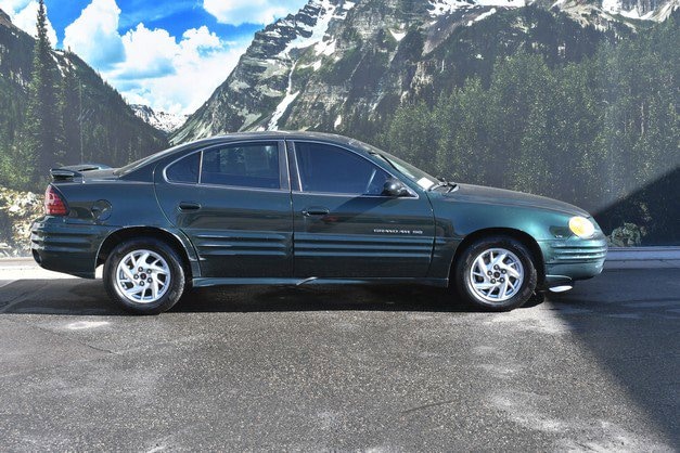 Used 2002 Pontiac Grand Am SE1 with VIN 1G2NF52E62M576170 for sale in Denver, CO