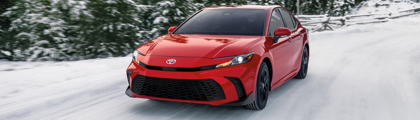 Red Toyota Camry
SE driving in the snow