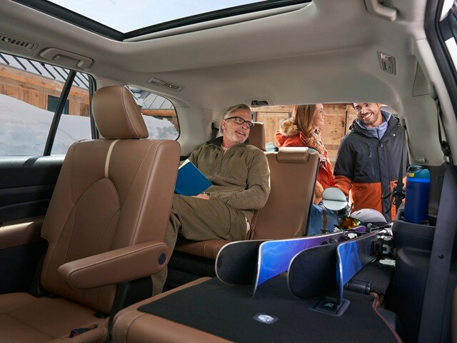 Grand Highlander rear interior with skis in the
SUV