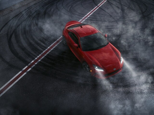 GR86 doing
donuts on a track