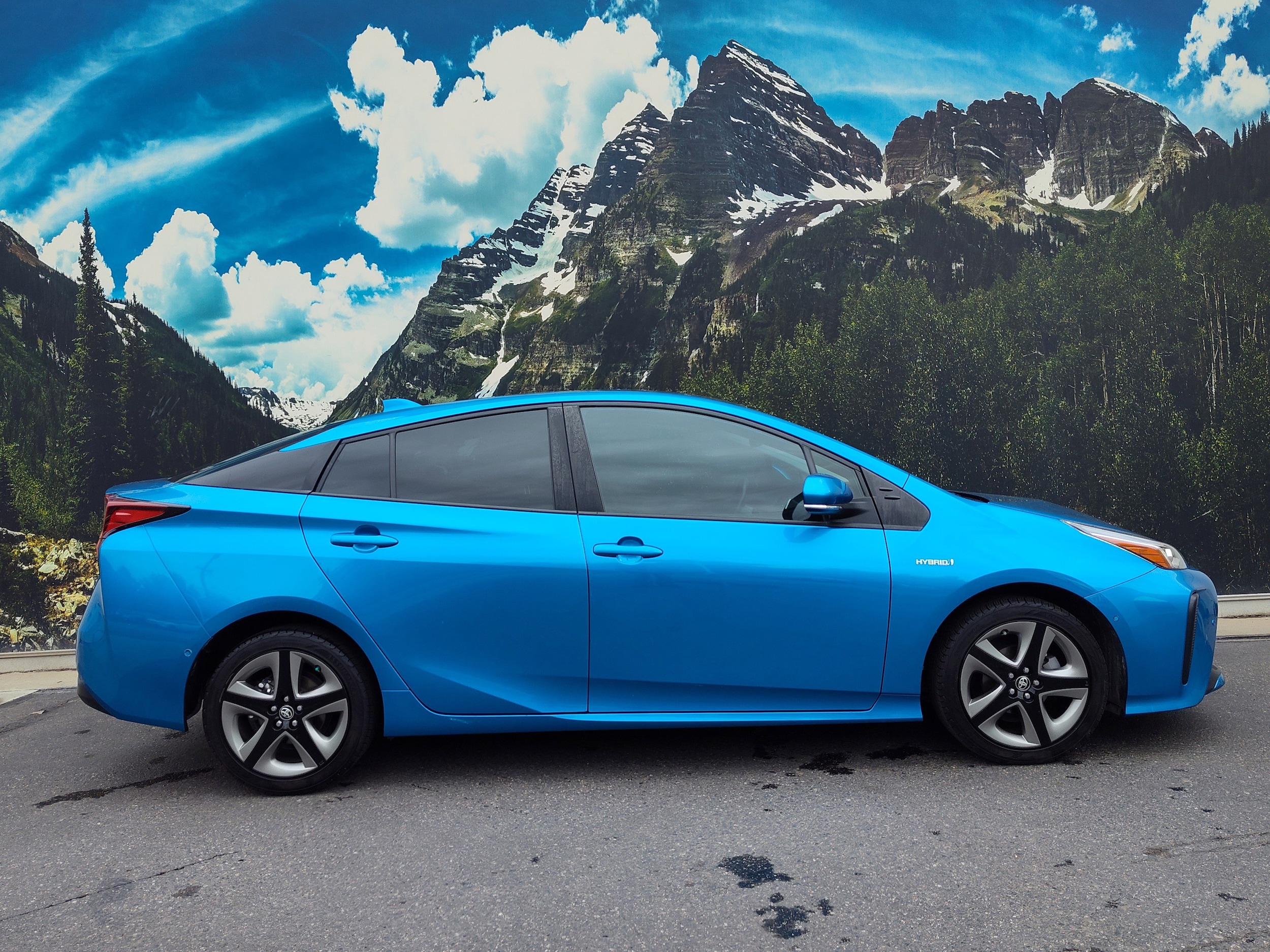 Certified 2021 Toyota Prius XLE with VIN JTDKAMFU9M3131570 for sale in Denver, CO