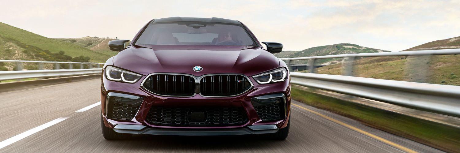 new BMW M8 Gran Coupe driving toward the camera