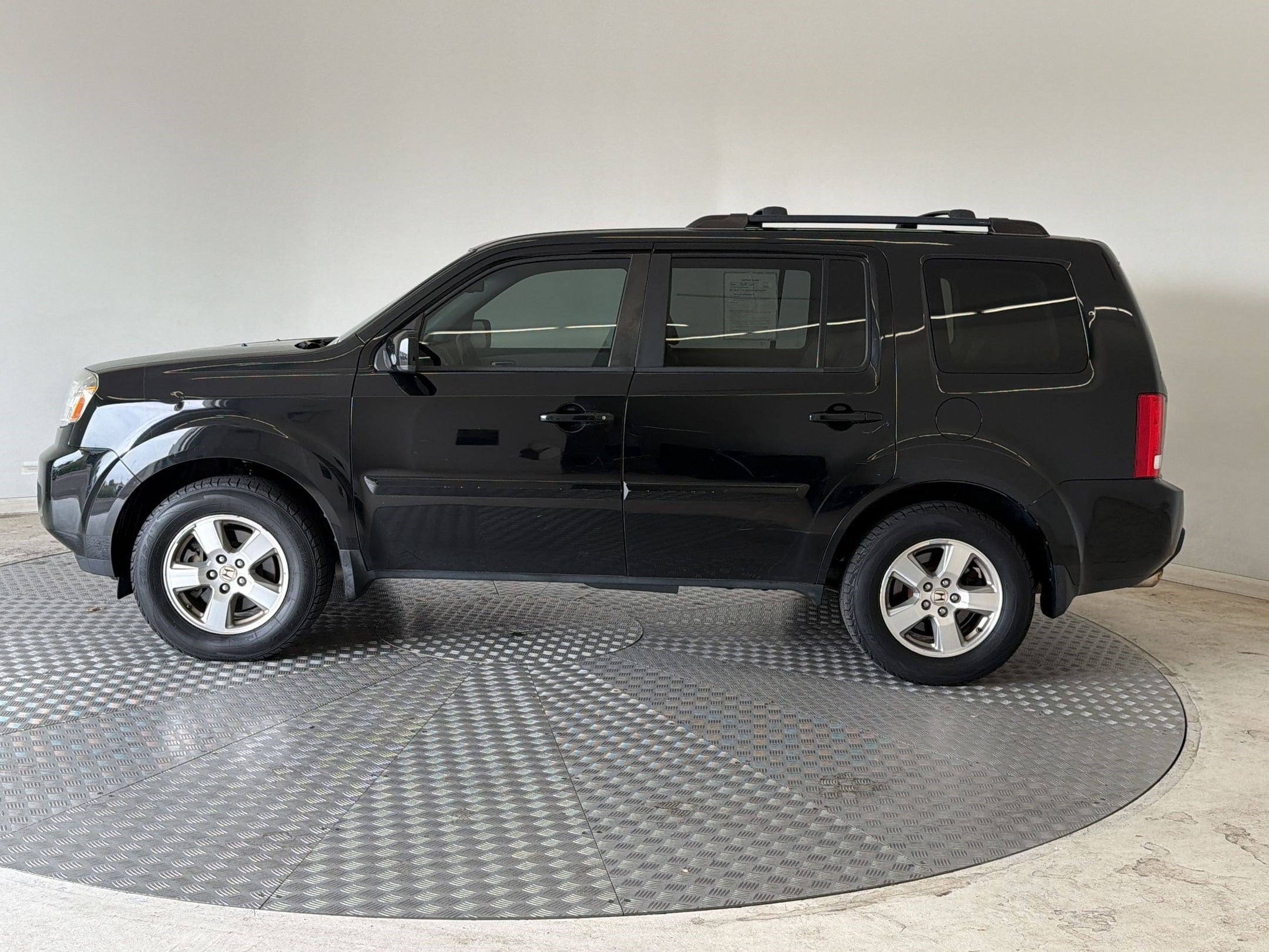 Used 2011 Honda Pilot EX-L with VIN 5FNYF4H59BB002536 for sale in Denver, CO